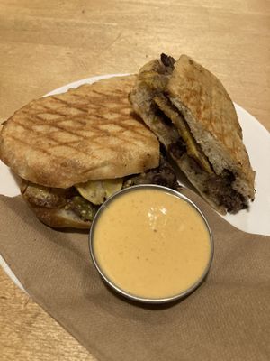 Black bean and plantain panini with vegan spicy mayo  at La Graine Brulée in Montreal