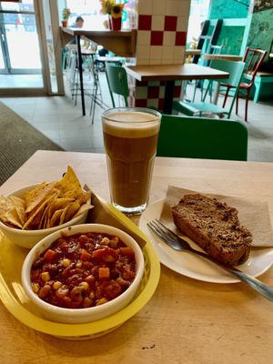 Petit chili, grand latté, pain bananes-dates-chocolat.  at La Graine Brulée in Montreal