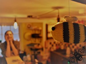 A chonky bumbler, knitted for us by Queen Tasty B's sister. WE LOVE IT. at Bumbles' Rest Cafe in Ambleside