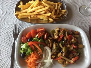 Vegan plate made after asking and french fries at Restaurante Rumar in Faial