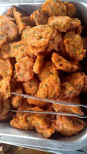 Vegan fried spicy fishless cake at Nang Aharn Jay in Bangkok