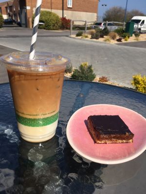 Iced Almond vanilla latte and raw caramel slice at KIND - Coffee & eatery in Chichester