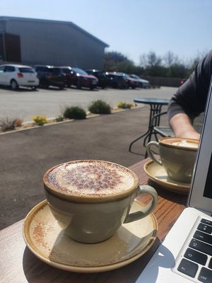 Coconut cappuccino outside at KIND - Coffee & eatery in Chichester