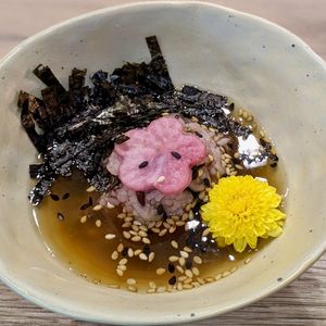 Ume Ochazuke with Millet Mixed Coloured Rice, Chrysanthemum, and Shiso Leaf in Housemade Vegan Dashi Consommé at WakaMama in Central Singapore