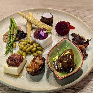 Hassun with Sake Edamame, Shoyu Koji Handmade Tofu, Kombucha Scoby Compôte Handmade Tofu, Braised Miso Baby Yam, Bacon Enoki, Miso Eggplant Unagi, etc at WakaMama in Central Singapore