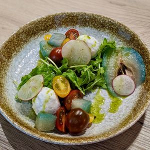 Housemade Vegan Burrata Cheese & Heirloom Cherry Tomato Medley with Sous Vide Autumn Pear in Kombucha Dulse Shiso Dressing at WakaMama in Central Singapore