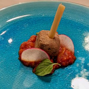 Meatless Jackfruit Cube with Sautéed Lemongrass & Perfume Mint Leaf on Cherry Tomato Onion Sauce at WakaMama in Central Singapore