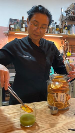 Chef Joyce preparing vegan sake pairing at WakaMama in Central Singapore