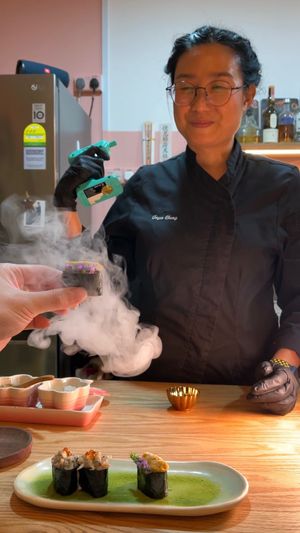 Chef Joyce serving vegan sushi at WakaMama in Central Singapore