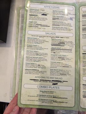 Vegan menu options at register at The Natural Cafe in Goleta