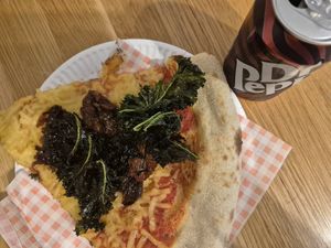 Kale and sweet onions and dried tomatoes  really delicious at Civerinos Slice - Prom Slice in Edinburgh