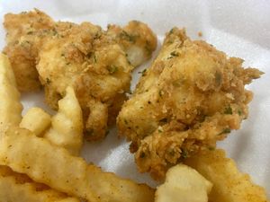 Fried cauliflower with fries. at Hungry Vegan in Savannah