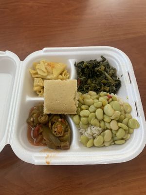 Mac n cheese, greens, cornbread, lima beans, rice, and okra  at Hungry Vegan in Savannah