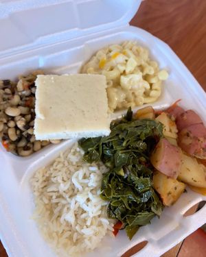 Black eyed peas, cornbread, mac and cheese, rice, greens, potatoes - all so good! at Hungry Vegan in Savannah