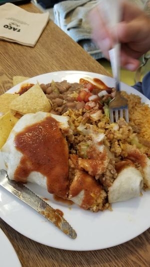 Vegan burrito cut up with salsa on top at Taco Amigo - 타코 아미고 in Seoul