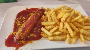 Vegane Currywurst mit Pommes at Café Waltenbergstüberl in Seeon