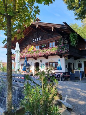 Café terrace in summer at Café Waltenbergstüberl in Seeon