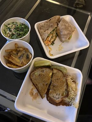 Salad, poutine, Buffalo “chicken” wrap and Reuben Delivered right to our hotel airport room. 10/10. at Fresh Kitchen + Juice Bar Hurontario in Mississauga