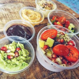 Avocado bread spread, fruit jam, peanut butter, hummus, vegan greek joghurt with fruit and a side salad at Goldjunge Aachen-Laurensberg in Aachen