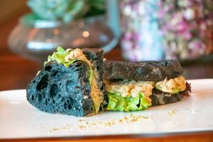 Sandwich with activated charcoal sour bread at Urban Garden Cafe in Sofia