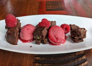 Chocolate torte with raspberry sorbet. at Blue Sushi Sake Grill in Austin