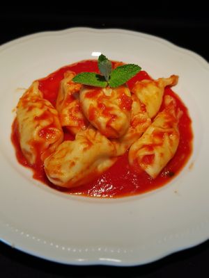 Vegan Stuffed Pasta Culurgiones with Marinara Sauce at The Rolling Pin Cooking School in Padua