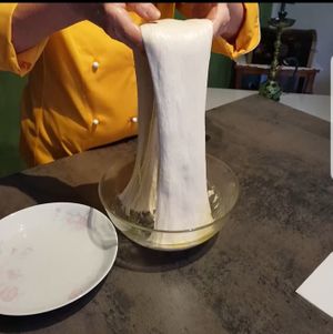 Making focaccia by hand at The Rolling Pin Cooking School in Padua