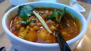 Channa Gobi, a chickpea and cauliflower main dish ordered vegan at Cinnamon, as served June 2021.  at Cinnamon in Rhinebeck