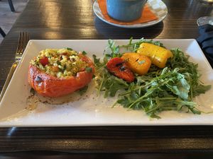 This is their risotto stuffed tomato with roasted peppers and arugula. Great risotto. at Ka Papa Cuisine in Sarasota