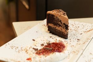 Chocolate Cake with Salted Caramel Frosting at Ka Papa Cuisine in Sarasota