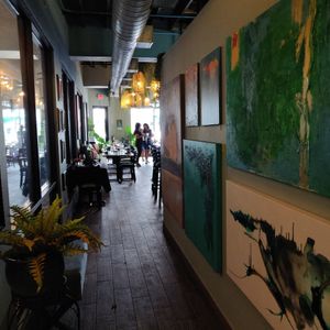Loved the art, but interior is too dark. at Ka Papa Cuisine in Sarasota