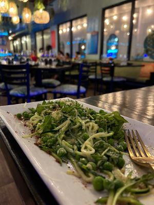 Squash noodle dish with fresh greens at Ka Papa Cuisine in Sarasota