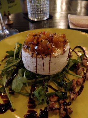 Warm brie with mango chutney, rucola, walnut and balsamic vinegar at Ka Papa Cuisine in Sarasota