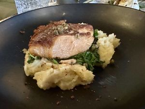 Salmon w potatoes ( after a bite)  at Ka Papa Cuisine in Sarasota