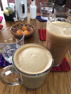 Soy latte & juice with strawberries, celery, and so much more.   at Calmate Cafe in Puerto Vallarta