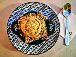 Delicious fruity crumble with tasty vegan ice cream for dessert. at Parsley and Thyme in Silves