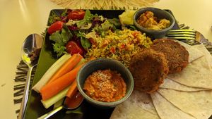 I opened for the Middle Eastern Plate, which was amazing; I couldn't finish it all. If we were to be here more than just the day, we would absolutely return! at Parsley and Thyme in Silves