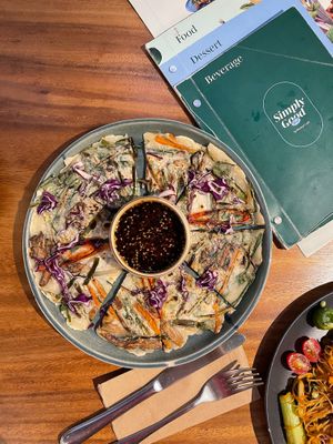 Korean Vegetables Pancake RM22
This Korean pancake is loaded with fresh vegetables and served with a sweet sesame
dressing.
 at Simply Good Food in Kuala Lumpur
