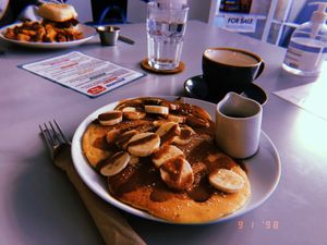 Pancakes and breakfast muffin  at Slice + Dice in Norwich