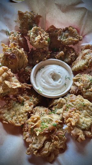 Beer, battered fried pickles  at Tony's Darts Away in Burbank