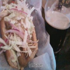 Field Roast apple sage sausage with apple coleslaw and relish at Tony's Darts Away in Burbank