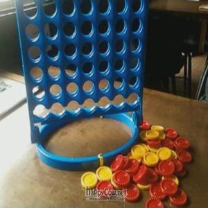 playing Connect Four and there are many other games too! at Tony's Darts Away in Burbank