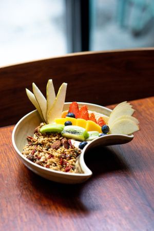 Organic fruits with homemade Grenola 🍉 at Faire Brunch & Drinks in Barcelona