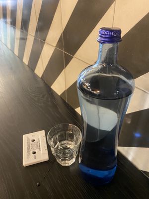 Menu and water   at Faire Brunch & Drinks in Barcelona