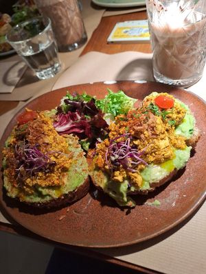 Avocado toast with scrambled eggs at Faire Brunch & Drinks in Barcelona