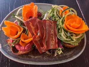Avocado and beetroot toast with vegan baconn  at Faire Brunch & Drinks in Barcelona