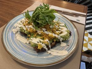 Avocado toast with tofu scramble   at Faire Brunch & Drinks in Barcelona
