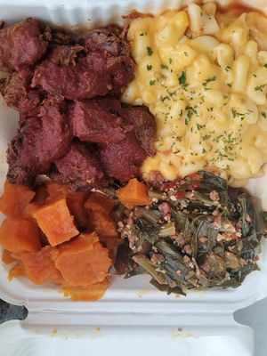 Vegan Rib Tips, candied yams, greens and vegan Mac n cheese. at Vegan Mob in San Bruno
