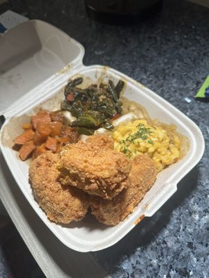 Chicken, greens, smackeroni, and candied yams!  at Vegan Mob in San Bruno
