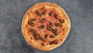 Our vegan meatball pizza with meatballs from Happy Little Plants at Monster Pizza in Deltona